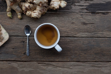 Hot ginger on the old wooden floor Drinking prevent flu