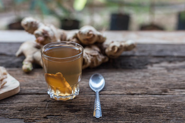 Hot ginger on the old wooden floor Drinking prevent flu