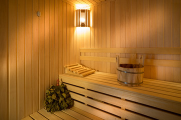 sauna bathhouse warm interior inside empty brooms barrels bucket for water