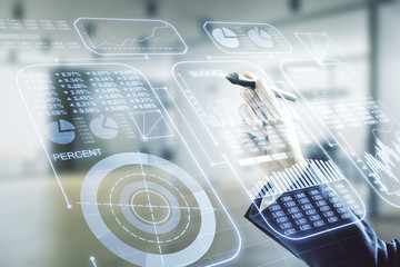 Double exposure of male hand with pen working with abstract virtual statistics data hologram on blurred office background, statistics and analytics concept