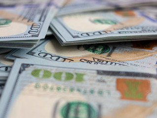 a bunch of dollar bills close up