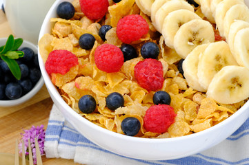 cereal in a white bowl on wooden background. Healthy breakfast concept.
