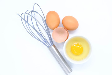 Close-up view of raw chicken eggs on background