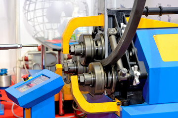 Industrial machine for bending steel pipes and metal rods. Pipe bending machine