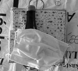 Corona Passover. Dust mask, bottle of wine and matzah - a traditional Jewish food for Passover