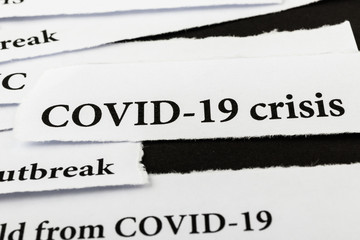 Coronavirus breaking news headline clippings from various newspapers reporting on the deadly...