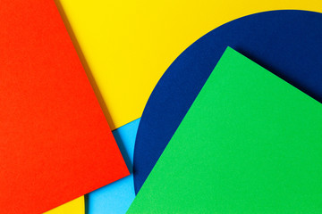 Abstract colored paper texture background. Minimal geometric shapes and lines in red, light blue,...