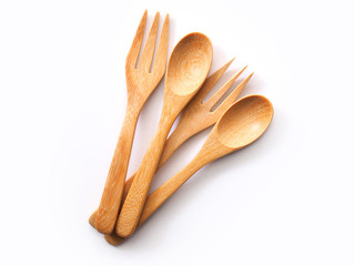 wooden spoon and fork kitchen utensils isolated on white background.