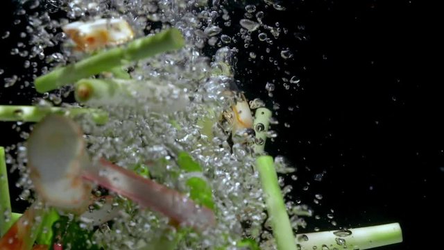 tom yum ingredient drop water slower motion