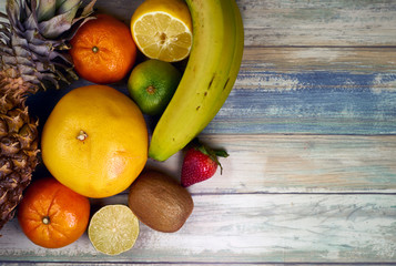 colorful fruit still life on a light blue table