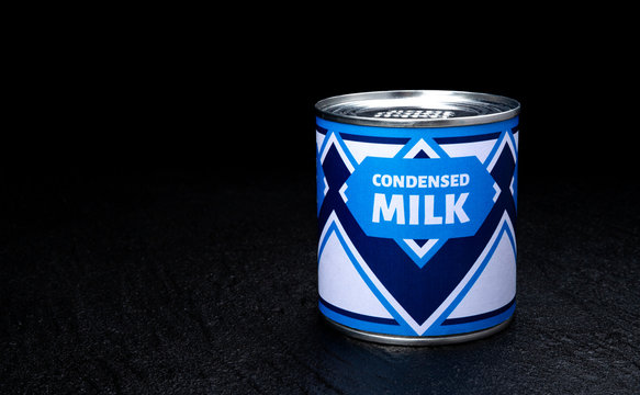 Condensed Milk Can On Black Background