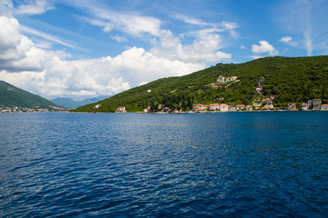 Beautiful views from the sea to the Adriatic coast of the Bay of Kotor.