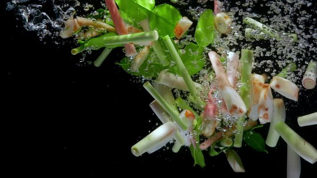 tom yum ingredient drop water slower motion