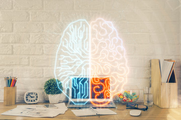 Double exposure of work space with computer and human brain drawing hologram. Brainstorm concept.