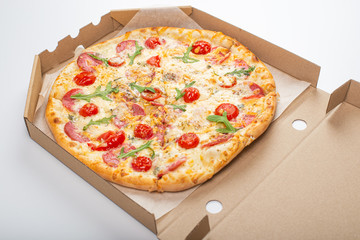 pizza with salami and tomatoes