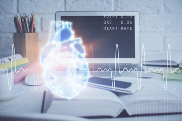 Desktop computer background and heart drawing. Double exposure. Medical study and healthcare concept.