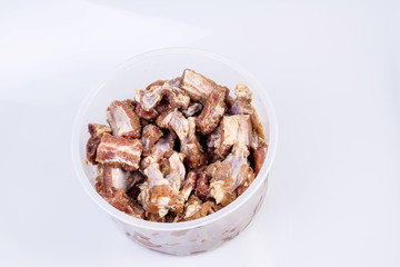 Sauce marinated Pork rib chop into pieces. Fried Pork Bone with Garlic .