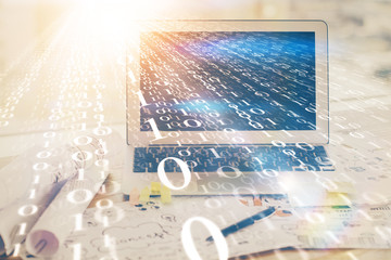 Double exposure of desktop computer and technology theme hologram. Concept of software development.