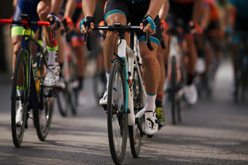 Naklejka na ściany i meble Group cyclist professional in a race.