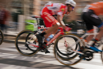 Group cyclist professional in a race. Photography in movement.