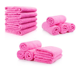 Obraz na płótnie Canvas Set of pink towels, isolated on white background