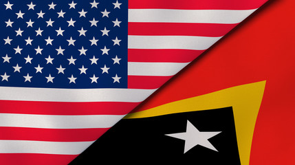 The flags of United States and East Timor. News, reportage, business background. 3d illustration