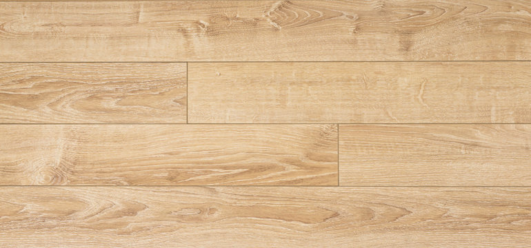 Laminate background. Wooden laminate and parquet boards for the floor in interior design. Texture and pattern of natural wood