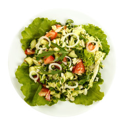 Fresh vegetable salad isolated on a white background
