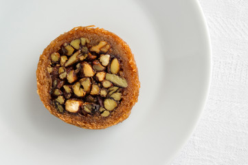 kataifi roll with almonds, pistachio, and peanuts