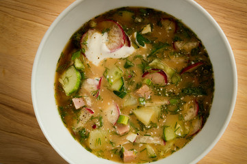 okroshka with smoked turkey, vegetables, and sour cream