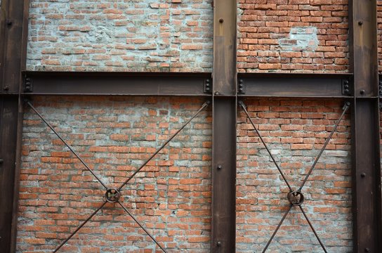 Old brick wall with steel beam structure