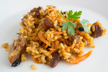 rice and mutton pilaf decorated with parsley