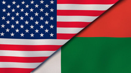 Fototapeta premium The flags of United States and Madagascar. News, reportage, business background. 3d illustration