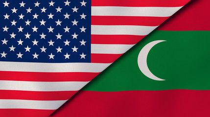 The flags of United States and Maldives. News, reportage, business background. 3d illustration