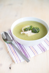 Broccoli, spinach cream soup in a bowl