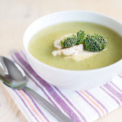 Broccoli, spinach cream soup in a bowl