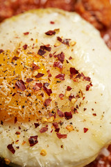 Fried egg with seasoning on rice