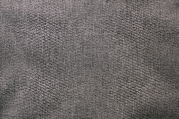 Fototapeta na wymiar Dark gray fabric texture, metallic color background cloth. Monochrome dark grey texture, wavy empty clothing material surface, blank wrinkled fabric canvas