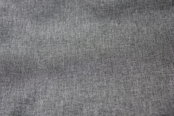 Fototapeta na wymiar Grey texture empty smooth cloth pattern. Soft gray background textile with selective focus, seamless fabric texture, simple gray colour canvas backdrop