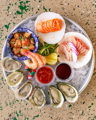 seafood plate sashimi oysters