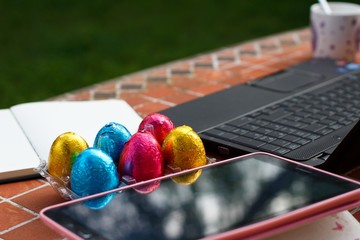 table photo with easter eggs working from home by covid-19