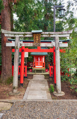 Fototapeta na wymiar Munakata-sha small shrine on the territory of Kitano Tenmangu shrine. Kyoto. Japan