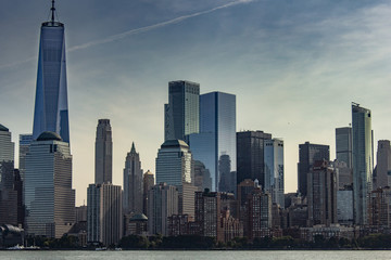 Fototapeta premium New York City with buildings, streets, during clear day
