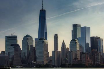 New York City with buildings, streets, during clear day