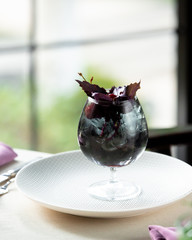cold berries with basil on the table
