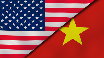 The flags of United States and Vietnam. News, reportage, business background. 3d illustration