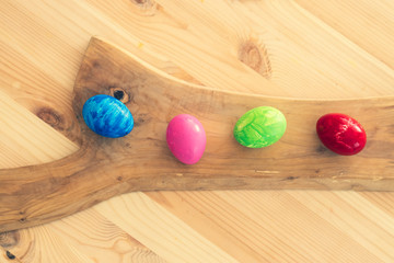 Easter eggs on wooden background