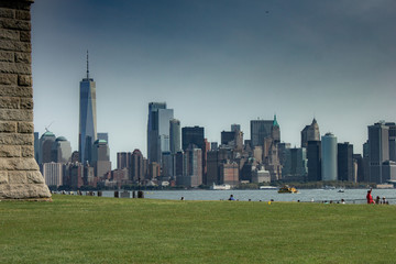 Ellis Island during clear day with Statue of Liberty