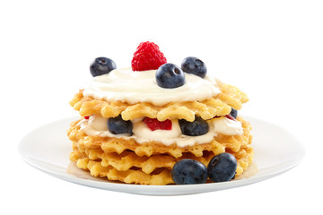 Fresh blueberries, raspberries and waffle cookies
