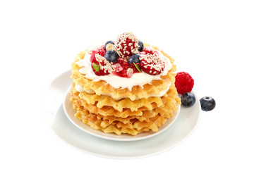 Fresh blueberries, raspberries and waffle cookies